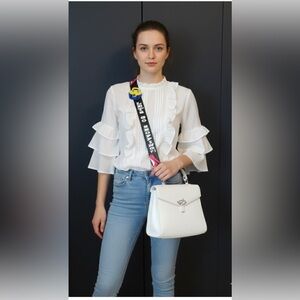 BRACCALINI white crossbody with a funky strap